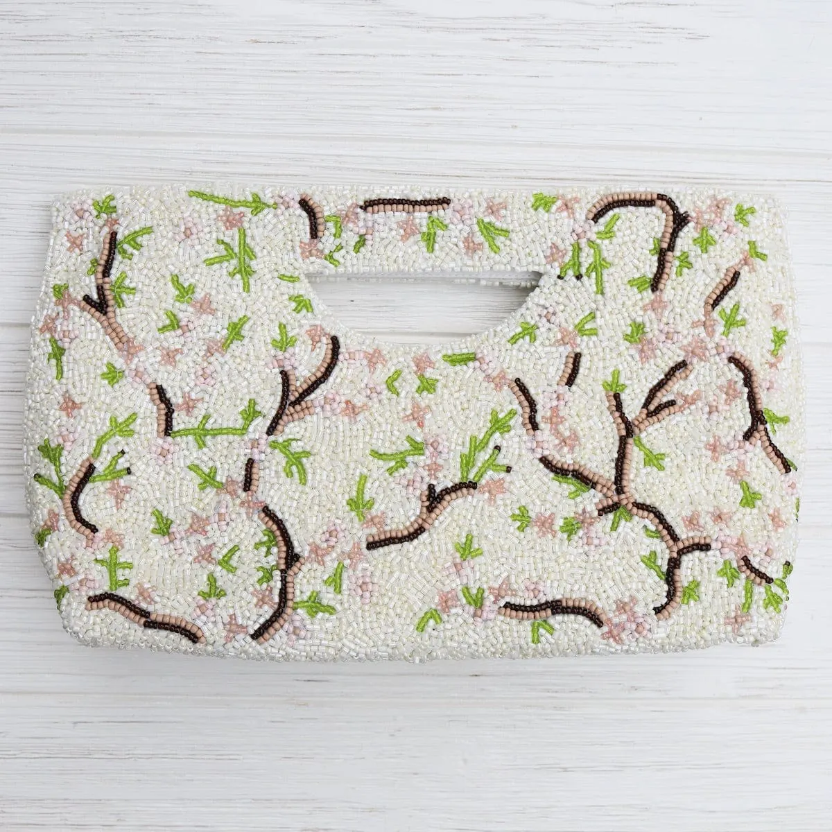 Cut Out Handle Clutch in Ivory with Peacocks