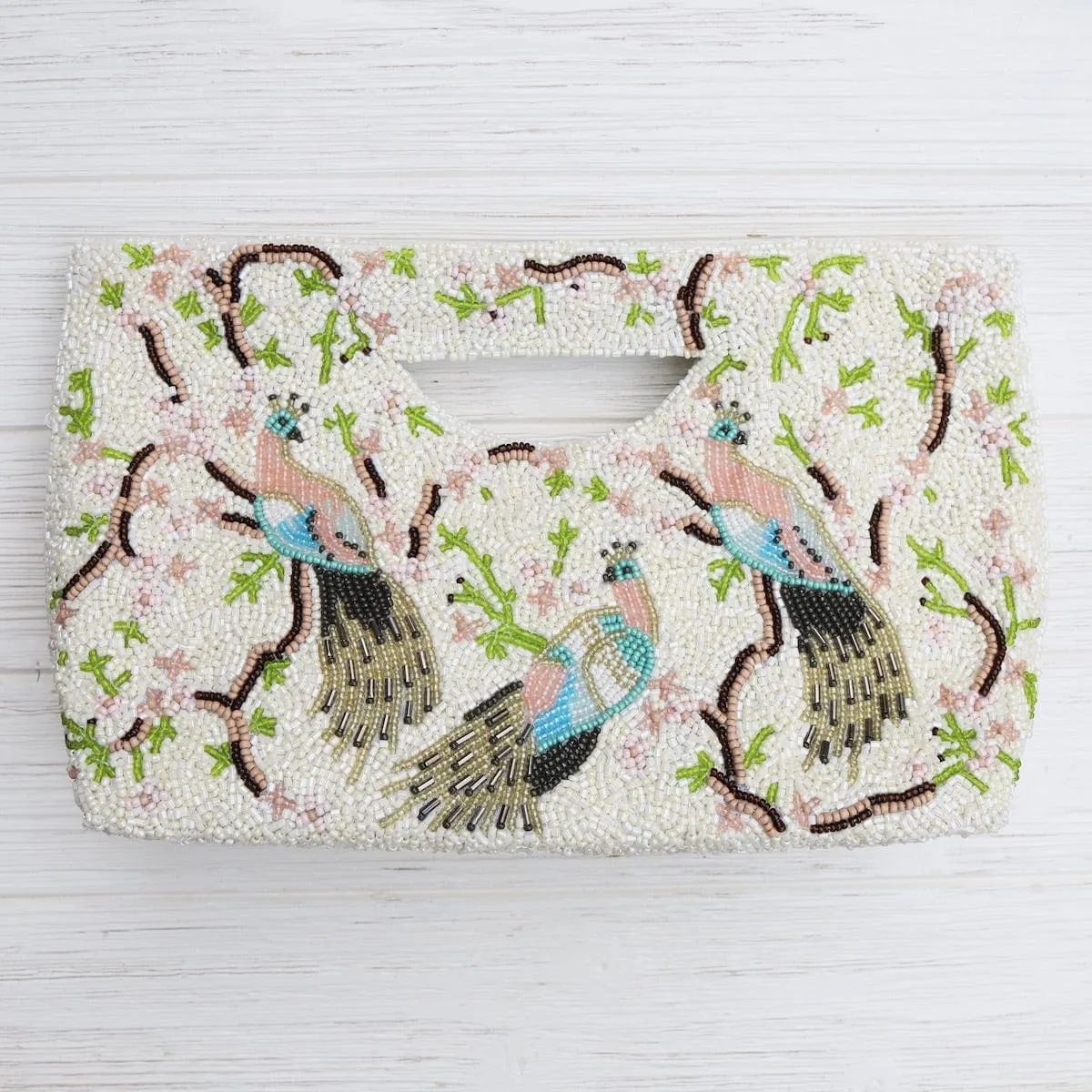 Cut Out Handle Clutch in Ivory with Peacocks